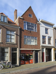 907366 Gezicht op de voorgevel van het pand Lange Nieuwstraat 21 (Oranje - Steakhouse & Pizzeria) te Utrecht.